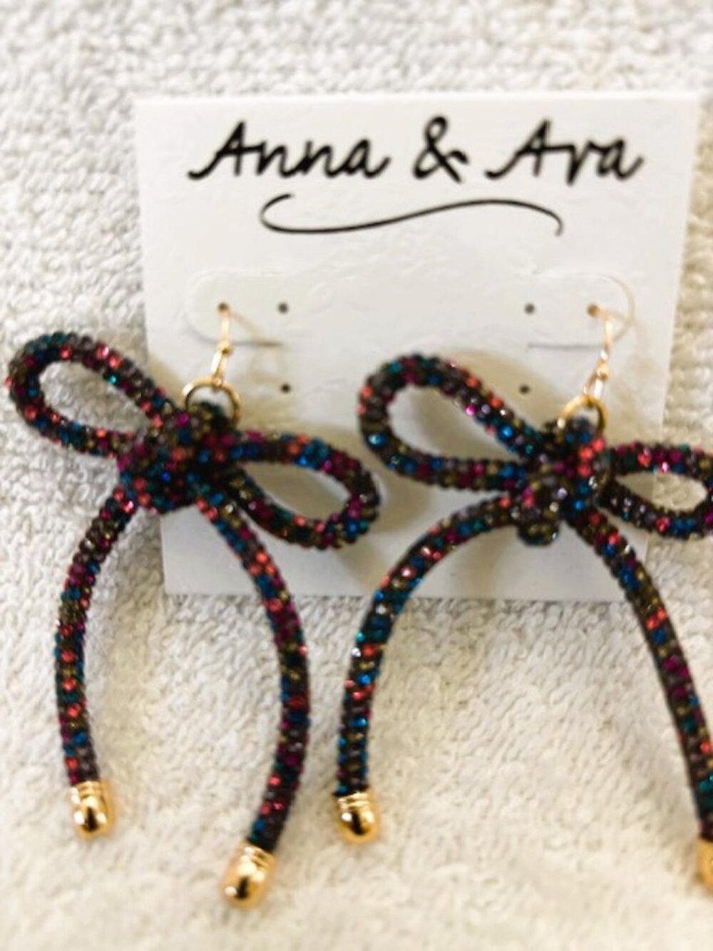 Anna & Ava sparkly bow pierced earrings with gold tone accents NWT